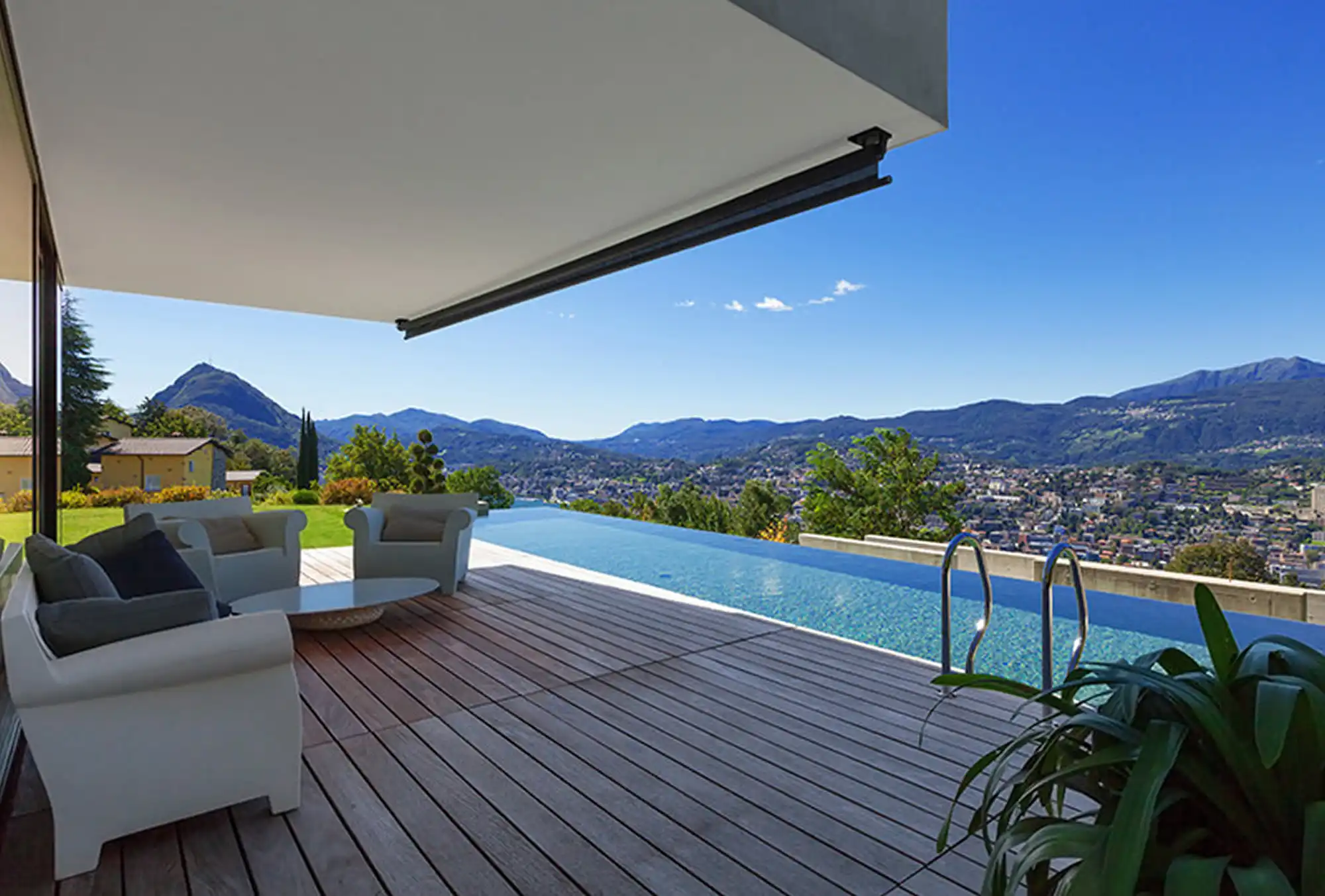 Modern luxury home with infinity pool and mountain views at 17921 Rossmont